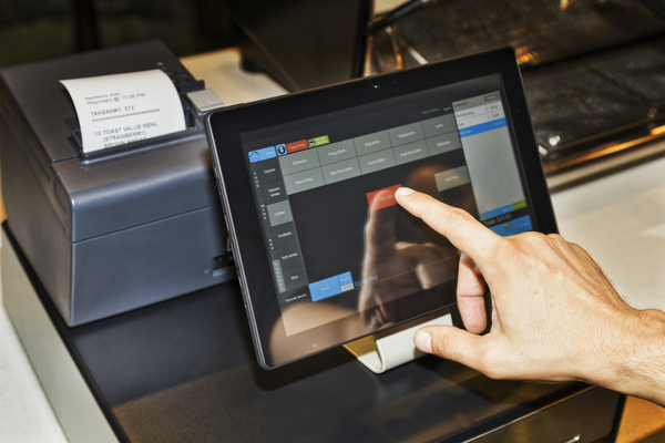 Person making changes on a restaurant POS