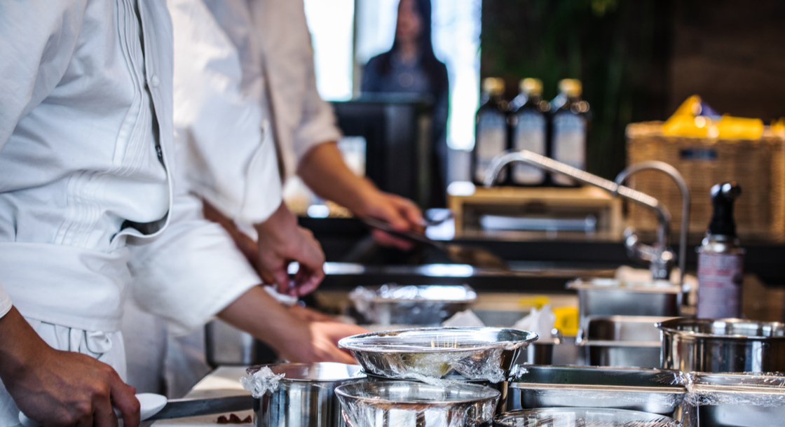 Chefs working in the kitchen.
